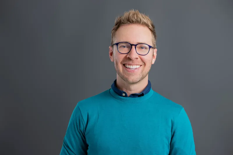 Nick Gray on a gray background