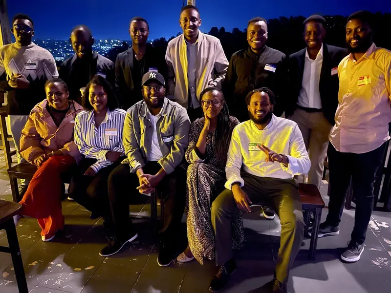 group of people with name tags smiling