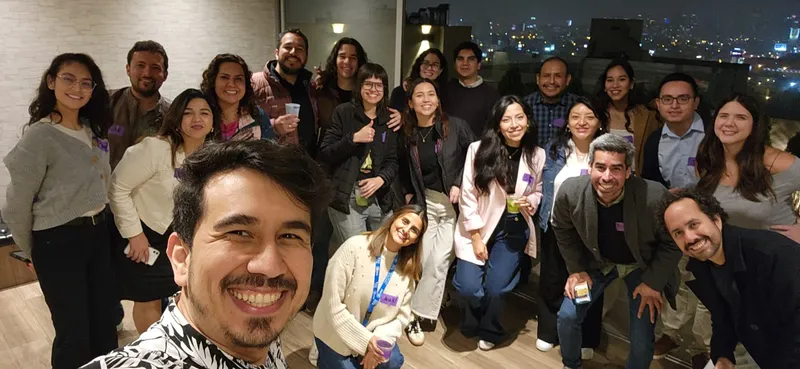 a group of people posing for a photo