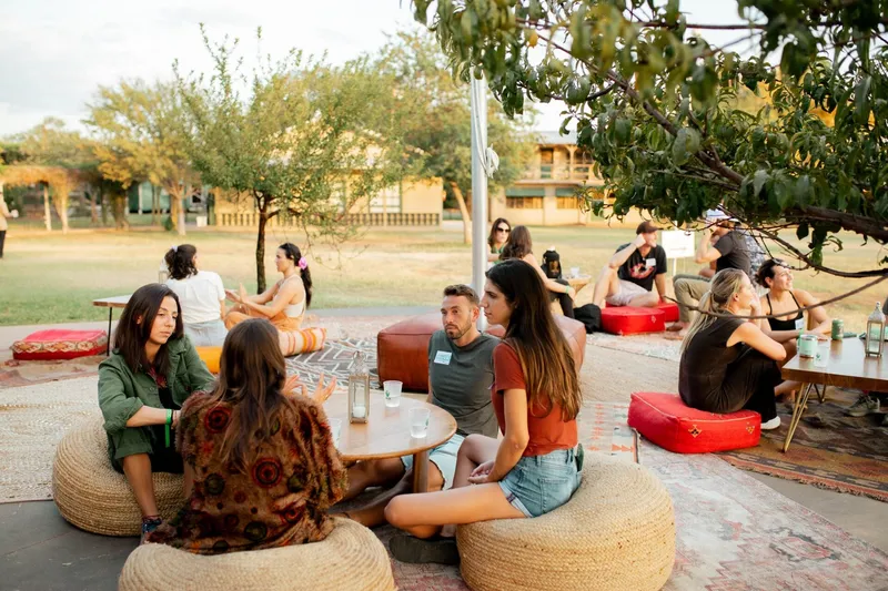 Group of people in a circle before meal time