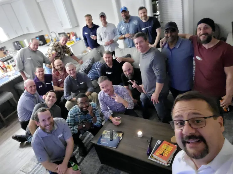 group of people with name tags smiling