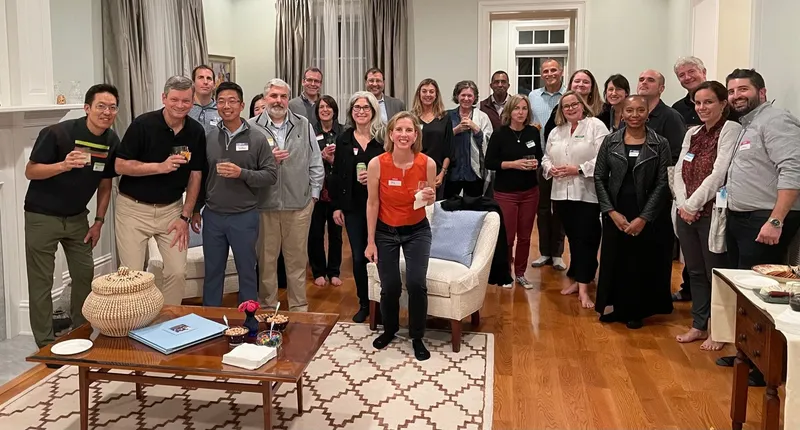 group of people with name tags smiling