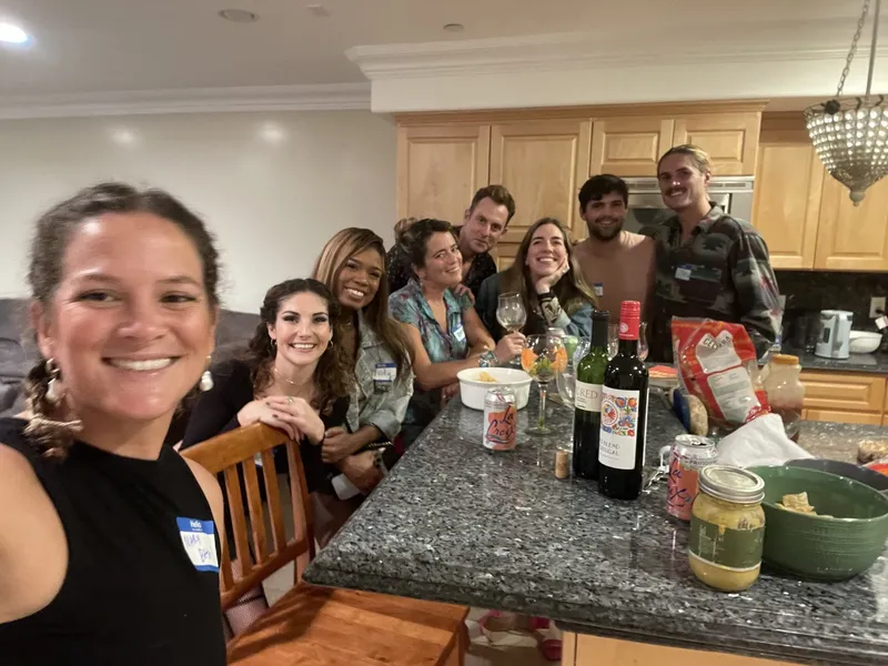 group of people with name tags smiling