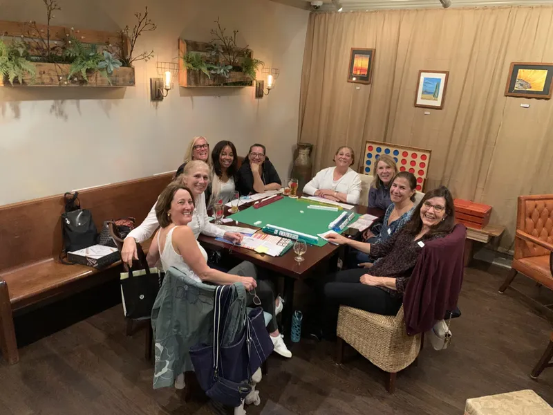group of people playing a board game