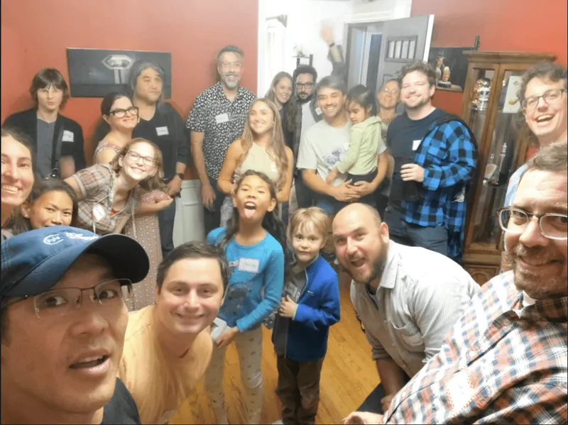 a group of people posing for a photo