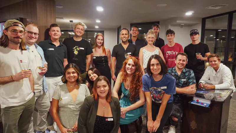 group of people with name tags smiling