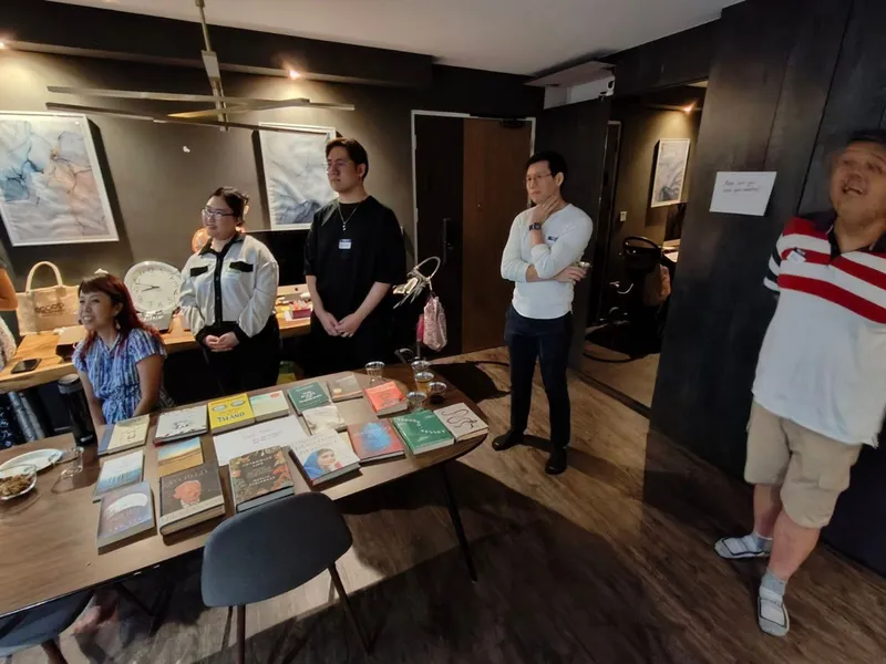 Marcus's guests listening to others while doing icebreakers