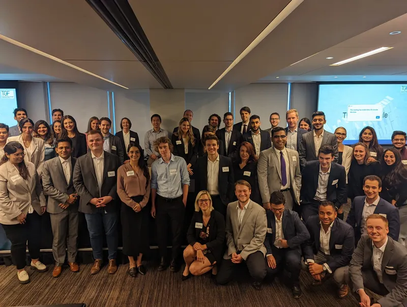 group of people with name tags smiling
