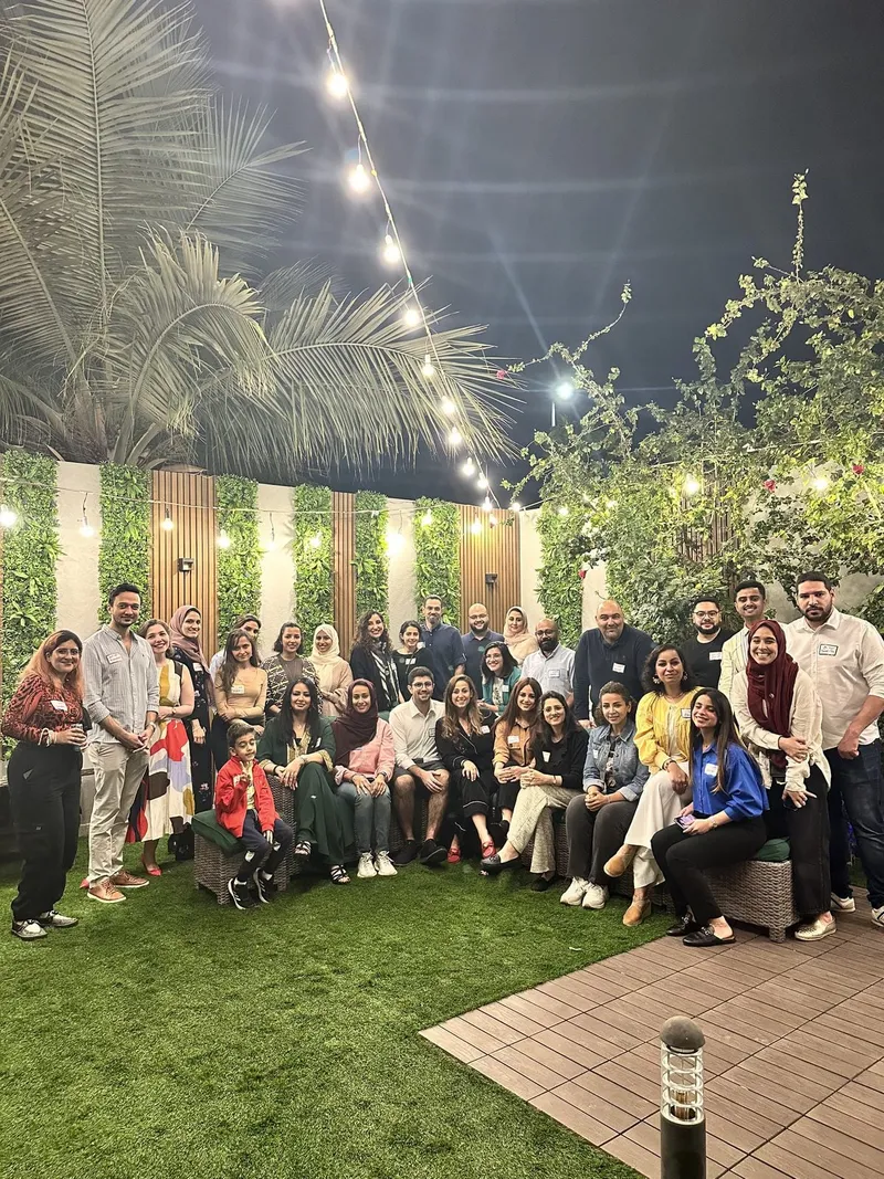 group of people smiling outdoors